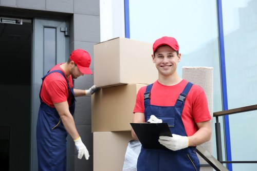 Loading a business relocation van on a West Kensington street