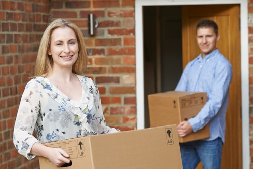 Packing and loading household items for a West Kensington move