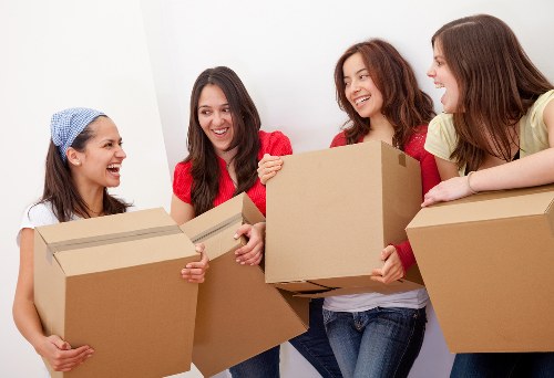 Careful loading of household items from a flat in West Kensington