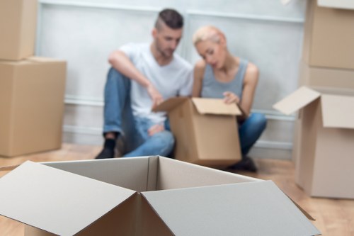Household move in a West Kensington flat with stairs and lift access