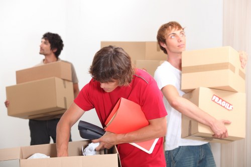 Careful handling of office equipment during a West Kensington relocation