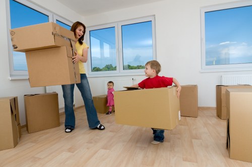 Packed boxes and furniture ready for house removals in West Kensington