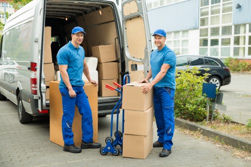 Professional movers handling a flat move in West Kensington