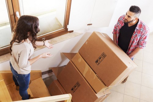 Preparation for furniture pick-up in West Kensington with items cleared for collection