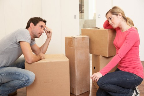 Furniture being moved from a West Kensington flat with stair access